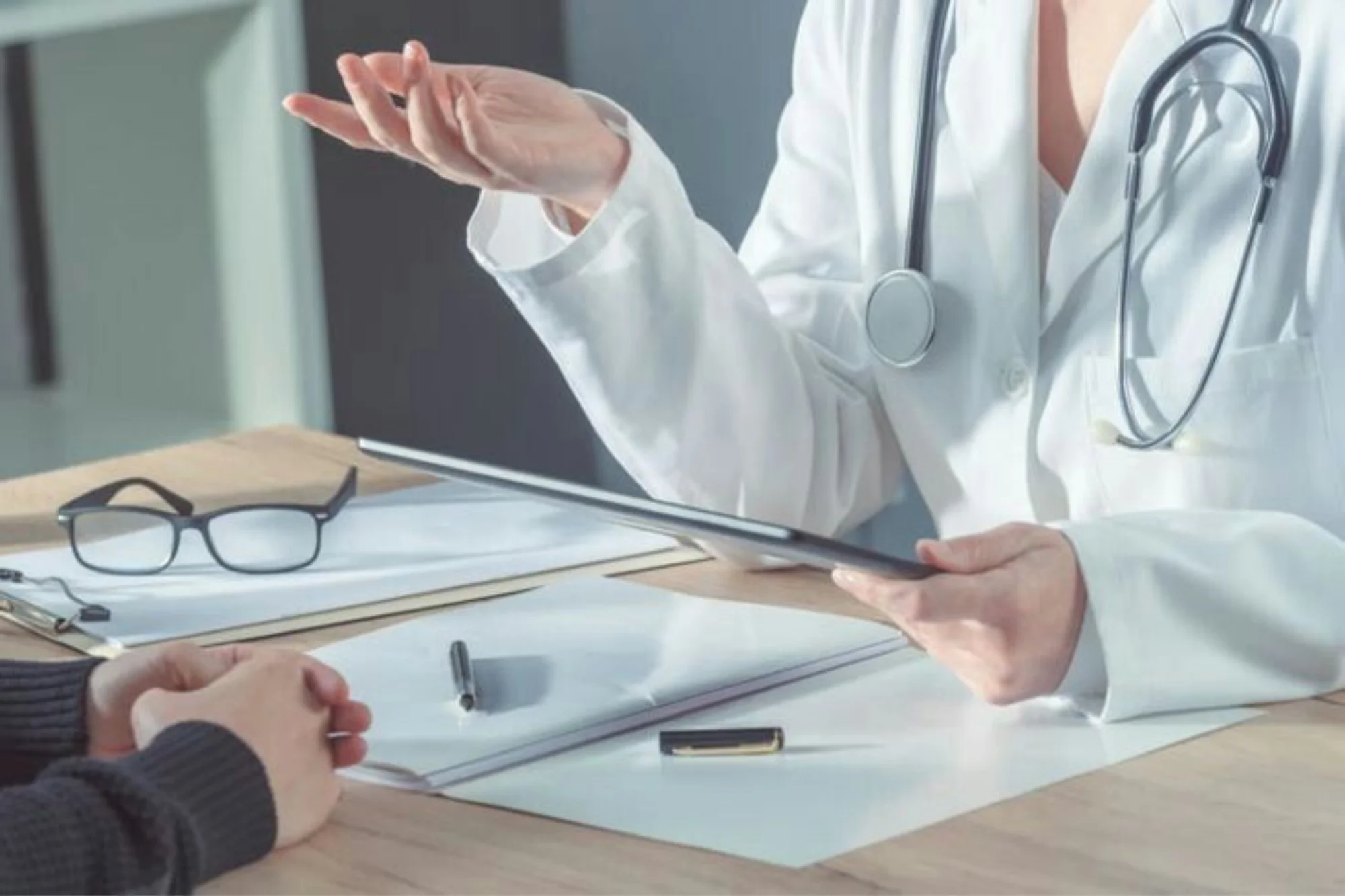 Doctor talking to patient