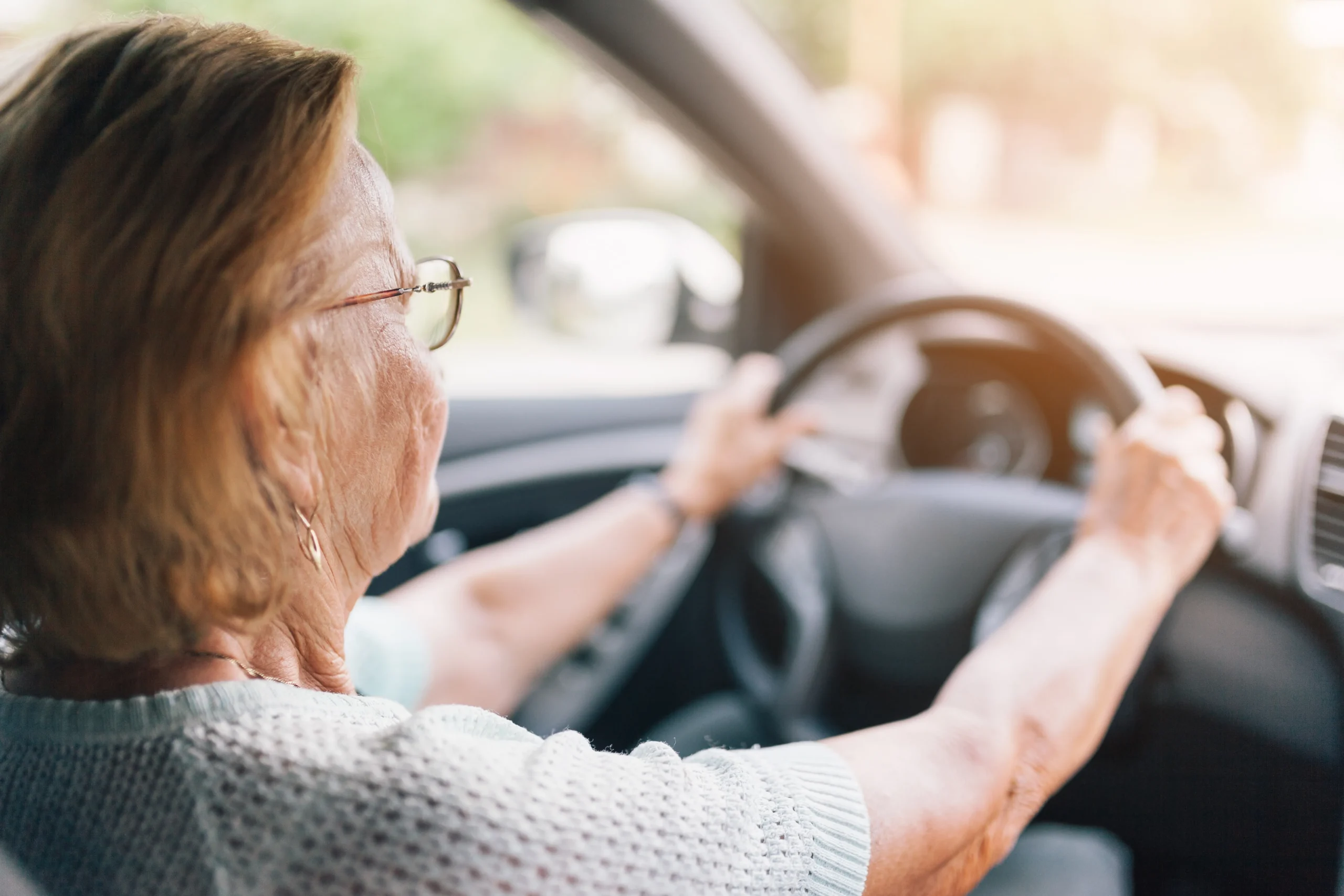 Women driving after having shoulder surgery